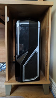 mid-ATX tower in desk