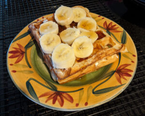 Sourdough waffles with bananas and maple syrup